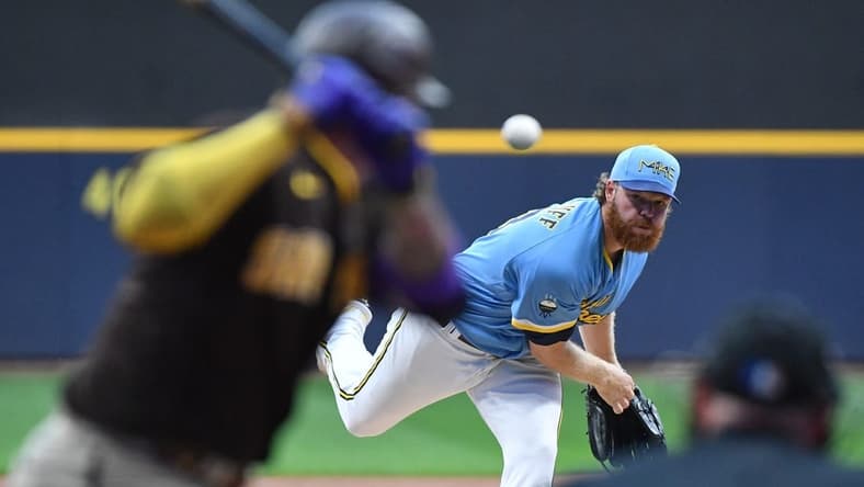 Aug 25, 2023; Milwaukee, Wisconsin, USA; Milwaukee Brewers starting pitcher Brandon Woodruff (53) delivers a pitch against the San Diego Padres in the first inning at American Family Field. Mandatory Credit: Michael McLoone-USA TODAY Sports