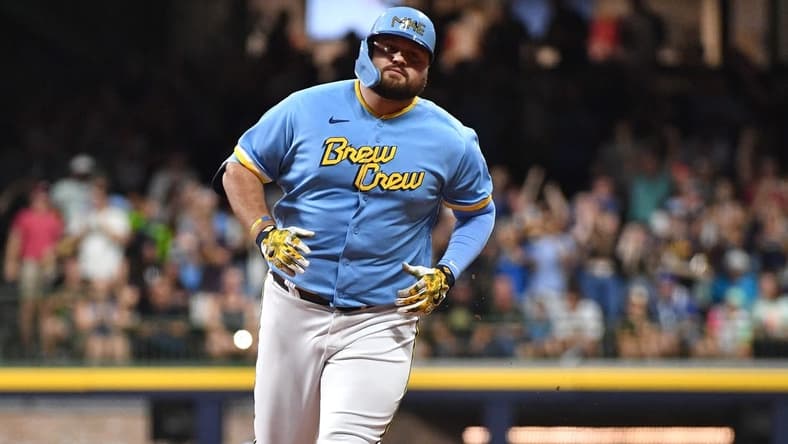 Aug 25, 2023; Milwaukee, Wisconsin, USA; Milwaukee Brewers first baseman Rowdy Tellez (11) rounds the bases after hitting a home run agains the San Diego Padres in the third inning at American Family Field. Mandatory Credit: Michael McLoone-USA TODAY Sports