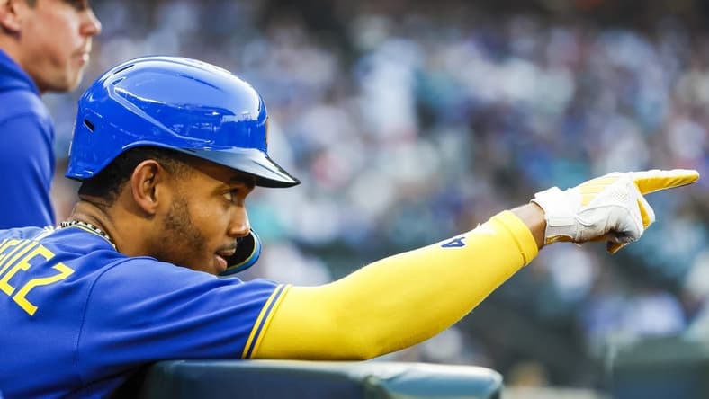 Aug 25, 2023; Seattle, Washington, USA; Seattle Mariners center fielder Julio Rodriguez (44) celebrates in the dugout after scoring a run against the Kansas City Royals during the first inning at T-Mobile Park. Mandatory Credit: Joe Nicholson-USA TODAY Sports
