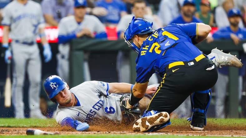 Aug 25, 2023; Seattle, Washington, USA; Seattle Mariners catcher Cal Raleigh (29) tags out Kansas City Royals center fielder Drew Waters (6) during the second inning at T-Mobile Park. Mandatory Credit: Joe Nicholson-USA TODAY Sports