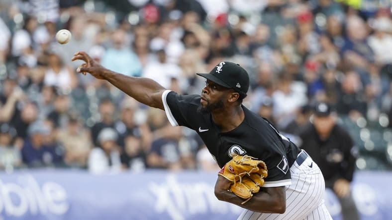 Aug 26, 2023; Chicago, Illinois, USA; Chicago White Sox starting pitcher Touki Toussaint (47) throws a pitch against the Oakland Athletics during the first inning at Guaranteed Rate Field. Mandatory Credit: Kamil Krzaczynski-USA TODAY Sports