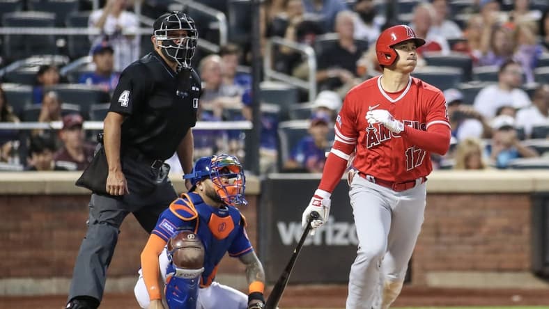 Aug 26, 2023; New York City, New York, USA;  Los Angeles Angels designated hitter Shohei Ohtani (17) hits an RBI triple in the second inning against the New York Mets at Citi Field. Mandatory Credit: Wendell Cruz-USA TODAY Sports