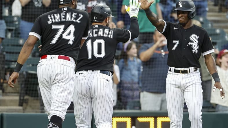 Aug 26, 2023; Chicago, Illinois, USA; Chicago White Sox third baseman Yoan Moncada (10) celebrates with shortstop Tim Anderson (7) after hitting a three-run home run against the Oakland Athletics during the third inning at Guaranteed Rate Field. Mandatory Credit: Kamil Krzaczynski-USA TODAY Sports