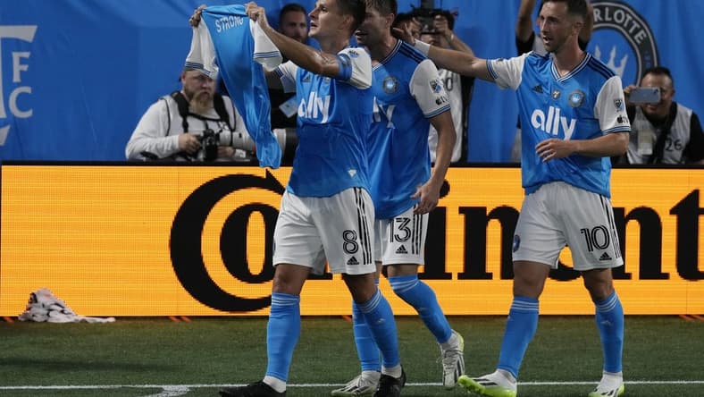 Aug 26, 2023; Charlotte, North Carolina, USA; Charlotte FC midfielder Ashley Westwood (8) celebrated goal in the first half against the Los Angeles FC at Bank of America Stadium. Mandatory Credit: Jim Dedmon-USA TODAY Sports