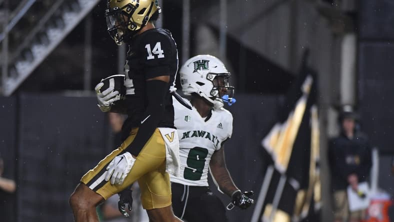 Aug 26, 2023; Nashville, Tennessee, USA; Vanderbilt Commodores wide receiver Will Sheppard (14) catches a touchdown pass during the first half against the Hawaii Warriors at FirstBank Stadium. Mandatory Credit: Christopher Hanewinckel-USA TODAY Sports