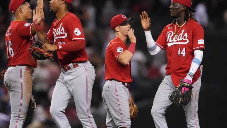 Aug 26, 2023; Phoenix, Arizona, USA; Cincinnati Reds players celebrate after defeating the Arizona Diamondbacks at Chase Field. Mandatory Credit: Joe Camporeale-USA TODAY Sports