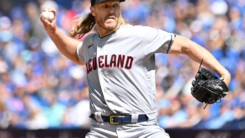 Aug 27, 2023; Toronto, Ontario, CAN;  Cleveland Guardians starting pitcher Noah Syndergaard (34) delivers a pitch against the Toronto Blue Jays in the first inning at Rogers Centre. Mandatory Credit: Dan Hamilton-USA TODAY Sports