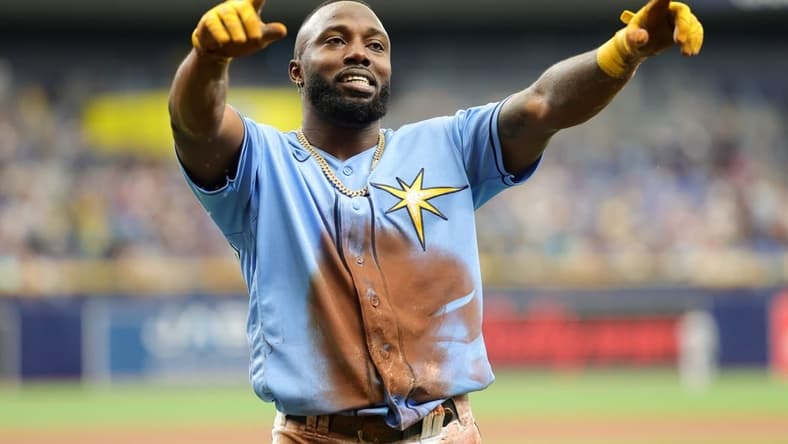 Aug 27, 2023; St. Petersburg, Florida, USA;  Tampa Bay Rays left fielder Randy Arozarena (56) reacts after scoring a run against the New York Yankees in the first inning at Tropicana Field. Mandatory Credit: Nathan Ray Seebeck-USA TODAY Sports