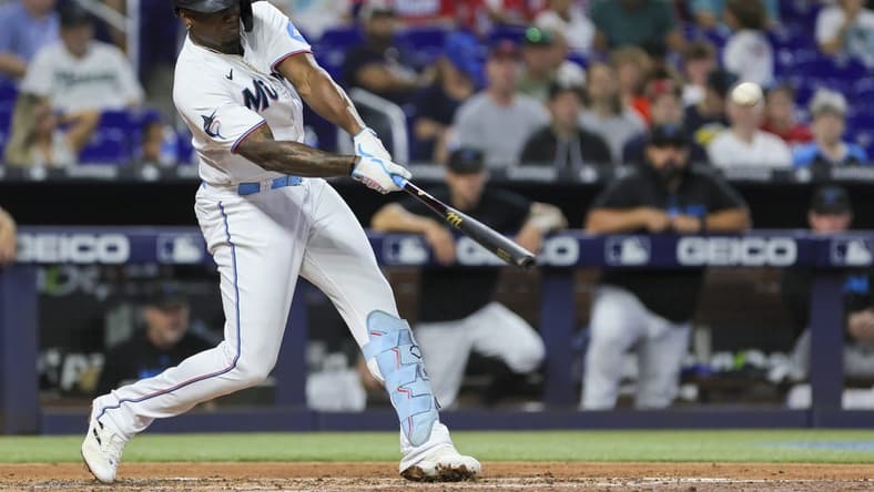 Aug 27, 2023; Miami, Florida, USA; Miami Marlins designated hitter Jorge Soler (12) hits a two-run home run against the Washington Nationals during the third inning at loanDepot Park. Mandatory Credit: Sam Navarro-USA TODAY Sports