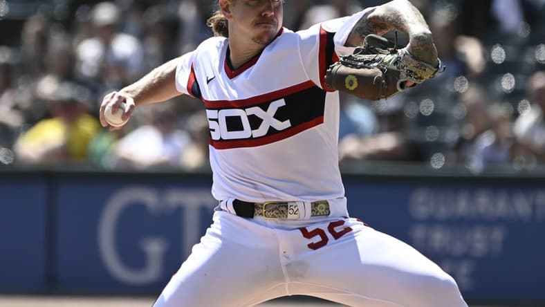 Aug 27, 2023; Chicago, Illinois, USA;  Chicago White Sox starting pitcher Mike Clevinger (52) delivers against the Oakland Athletics during the first inning at Guaranteed Rate Field. Mandatory Credit: Matt Marton-USA TODAY Sports