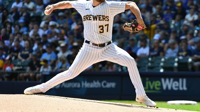 Aug 27, 2023; Milwaukee, Wisconsin, USA; Milwaukee Brewers starting pitcher Adrian Houser (37) delivers a pitch against the San Diego Padres in the first inning at American Family Field. Mandatory Credit: Michael McLoone-USA TODAY Sports