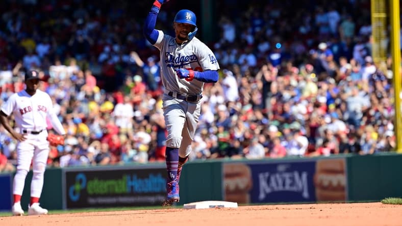 Aug 27, 2023; Boston, Massachusetts, USA; Los Angeles Dodgers second baseman Mookie Betts (50) celebrates his home run against the Boston Red Sox during the sixth inning at Fenway Park. Mandatory Credit: Eric Canha-USA TODAY Sports
