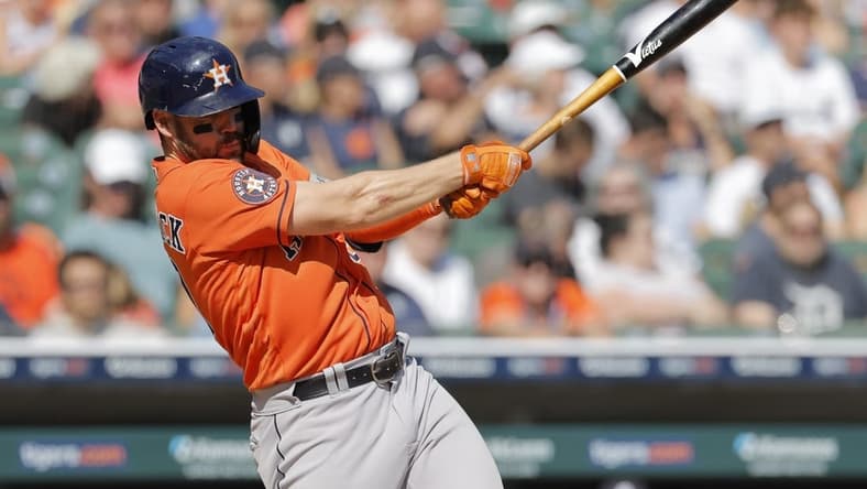 Aug 27, 2023; Detroit, Michigan, USA;  Houston Astros center fielder Chas McCormick (20) hits an RBI single in the eighth inning against the Detroit Tigers at Comerica Park. Mandatory Credit: Rick Osentoski-USA TODAY Sports