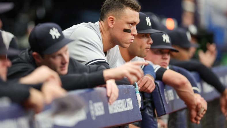 Aug 27, 2023; St. Petersburg, Florida, USA;  New York Yankees designated hitter Aaron Judge (99) looks on from the dugout against the Tampa Bay Rays in the seventh inning at Tropicana Field. Mandatory Credit: Nathan Ray Seebeck-USA TODAY Sports
