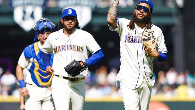 Aug 27, 2023; Seattle, Washington, USA; Seattle Mariners shortstop J.P. Crawford (3) celebrates following a 3-2 victory against the Kansas City Royals at T-Mobile Park. Mandatory Credit: Joe Nicholson-USA TODAY Sports