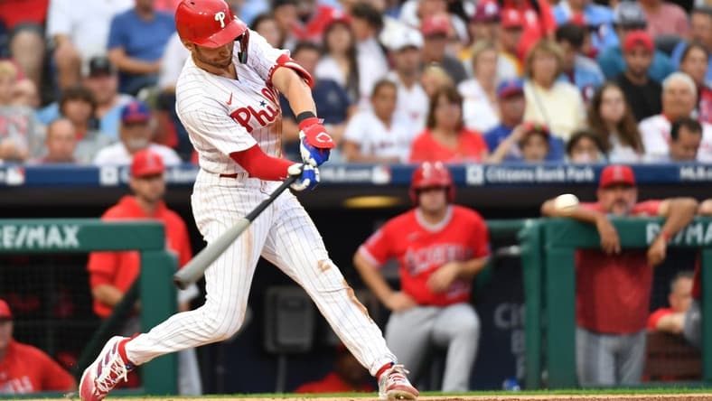 Aug 28, 2023; Philadelphia, Pennsylvania, USA; Philadelphia Phillies shortstop Trea Turner (7) hits a home run during the first inning against the Los Angeles Angels at Citizens Bank Park. Mandatory Credit: Eric Hartline-USA TODAY Sports