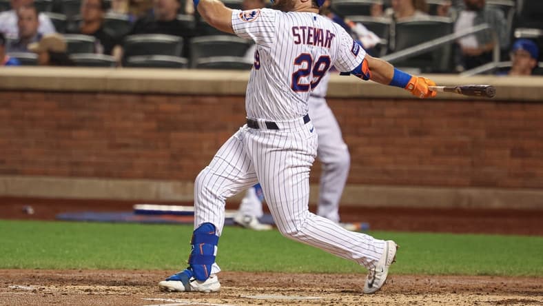 Aug 28, 2023; New York City, New York, USA; New York Mets right fielder DJ Stewart (29) hits a solo home run during the fifth inning against the Texas Rangers at Citi Field. Mandatory Credit: Vincent Carchietta-USA TODAY Sports