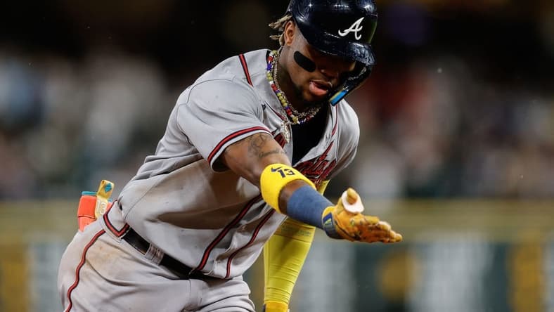 Aug 28, 2023; Denver, Colorado, USA; Atlanta Braves right fielder Ronald Acuna Jr. (13) gestures as he rounds the bases on a two run home run in the fifth inning against the Colorado Rockies at Coors Field. Mandatory Credit: Isaiah J. Downing-USA TODAY Sports