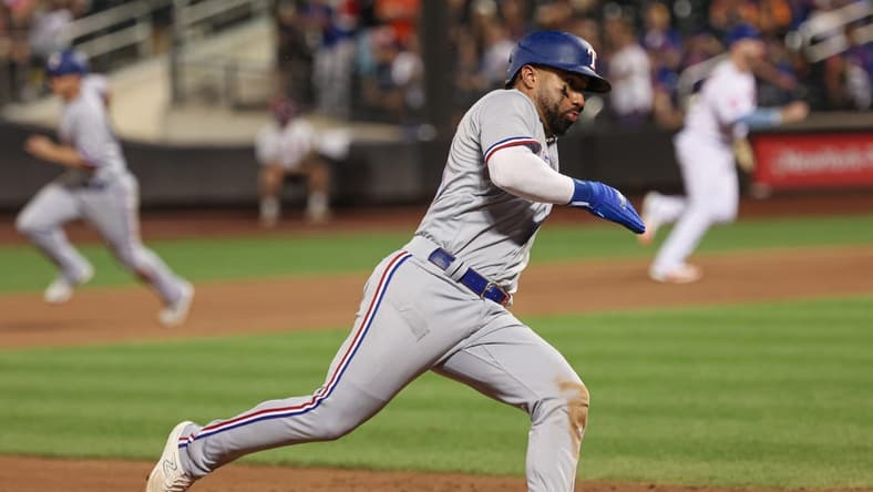 Aug 28, 2023; New York City, New York, USA; Texas Rangers shortstop Ezequiel Duran (20) rounds third base during the ninth inning against the New York Mets at Citi Field. Mandatory Credit: Vincent Carchietta-USA TODAY Sports