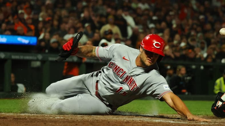Aug 28, 2023; San Francisco, California, USA; Cincinnati Reds left fielder Nick Senzel (15) scores a run against the San Francisco Giants during the eighth inning at Oracle Park. Mandatory Credit: Kelley L Cox-USA TODAY Sports