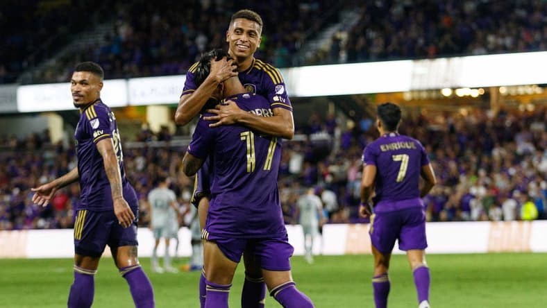 Aug 26, 2023; Orlando, Florida, USA; Orlando City SC midfielder Facundo Torres (17) and defender Rafael Santos (3) celebrate goal against St. Louis CITY SC in the second half at Exploria Stadium. Mandatory Credit: Morgan Tencza-USA TODAY Sports