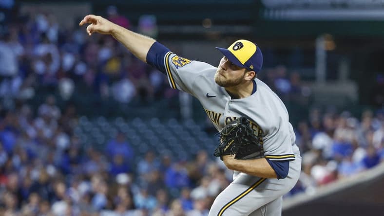 Aug 29, 2023; Chicago, Illinois, USA; Milwaukee Brewers starting pitcher Corbin Burnes (39) pitches against the Chicago Cubs during the first inning at Wrigley Field. Mandatory Credit: Kamil Krzaczynski-USA TODAY Sports