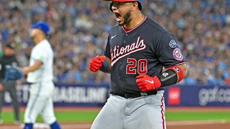 Aug 29, 2023; Toronto, Ontario, CAN;  Washington Nationals catcher Keibert Ruiz (20) reacts after hitting a three run home run in the fifth inning at Rogers Centre. Mandatory Credit: Dan Hamilton-USA TODAY Sports