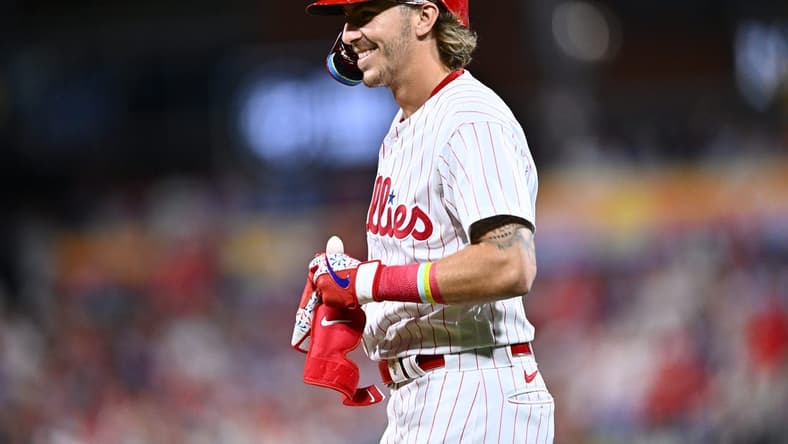 Aug 29, 2023; Philadelphia, Pennsylvania, USA; Philadelphia Phillies second baseman Bryson Stott (5) reacts after hitting an infield single against the Los Angeles Angels in the sixth inning at Citizens Bank Park. Mandatory Credit: Kyle Ross-USA TODAY Sports