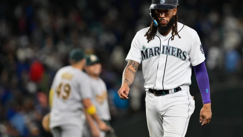 Aug 29, 2023; Seattle, Washington, USA; Seattle Mariners shortstop J.P. Crawford (3) walks off the field after the Oakland Athletics defeated the Seattle Mariners at T-Mobile Park. Mandatory Credit: Steven Bisig-USA TODAY Sports