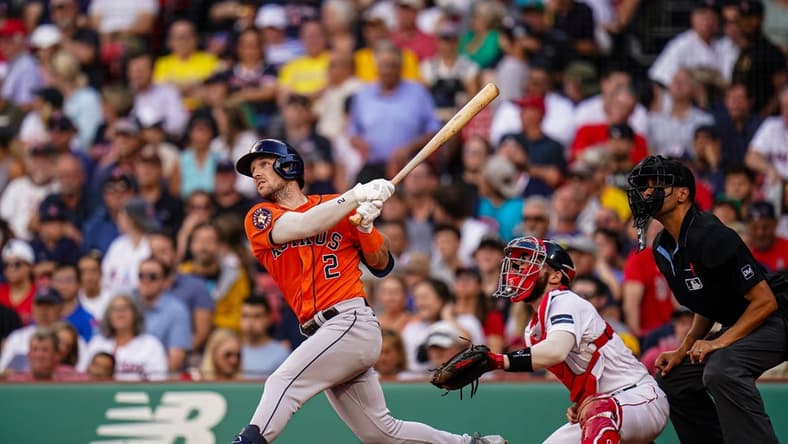 Aug 30, 2023; Boston, Massachusetts, USA; Houston Astros third baseman Alex Bregman (2) hits a double to drive in a run against the Boston Red Sox in the fourth inning at Fenway Park. Mandatory Credit: David Butler II-USA TODAY Sports