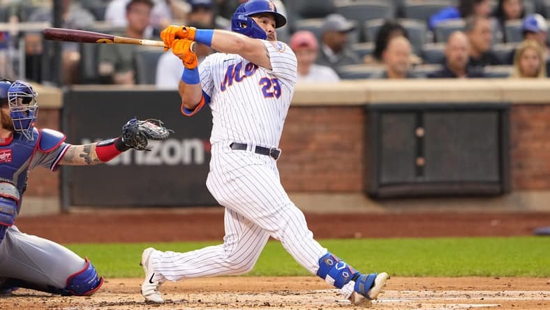 Aug 30, 2023; New York City, New York, USA;  New York Mets right fielder DJ Steward (29) hits a home run against the Texas Rangers during the second inning at Citi Field. Mandatory Credit: Gregory Fisher-USA TODAY Sports
