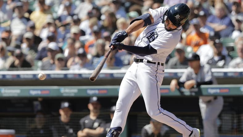 Aug 31, 2023; Detroit, Michigan, USA; Detroit Tigers center fielder Riley Greene (31) hits a single in the first inning against the New York Yankees at Comerica Park. Mandatory Credit: Rick Osentoski-USA TODAY Sports