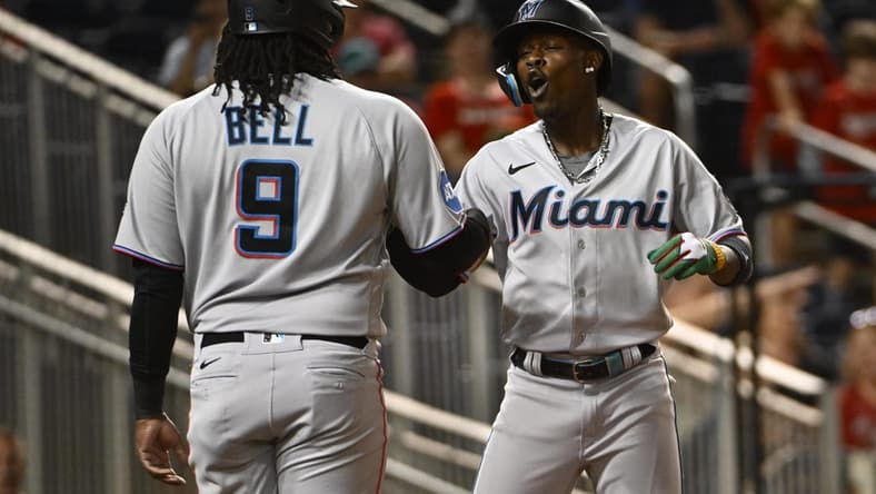 Aug 31, 2023; Washington, District of Columbia, USA; Miami Marlins center fielder Jazz Chisholm Jr. (2) celebrates with first baseman Josh Bell (9) after hitting a three run home run against the Washington Nationals during the fifth inning  at Nationals Park. Mandatory Credit: Brad Mills-USA TODAY Sports