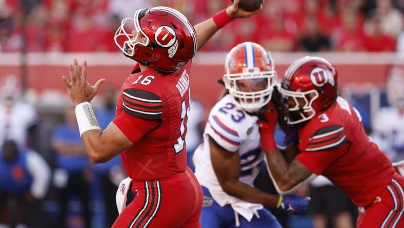 Aug 31, 2023; Salt Lake City, Utah, USA; Utah Utes quarterback Bryson Barnes (16) throws for a first half touchdown against the Florida Gators at Rice-Eccles Stadium. Mandatory Credit: Jeff Swinger-USA TODAY Sports