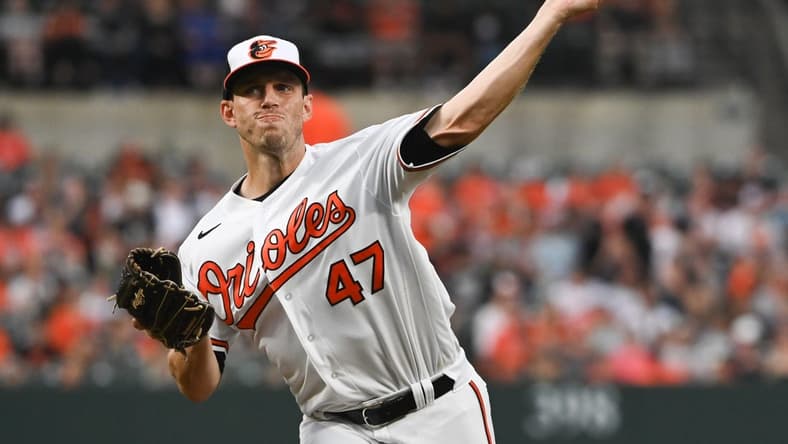 Apr 13, 2022; Baltimore, Maryland, USA;  Baltimore Orioles starting pitcher John Means (47) delivers a first inning pitch against the Milwaukee Brewers at Oriole Park at Camden Yards. Mandatory Credit: Tommy Gilligan-USA TODAY Sports