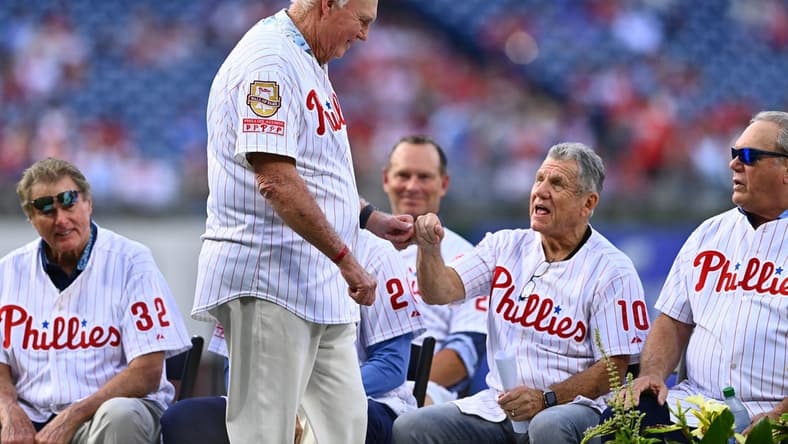 Aug 6, 2022; Philadelphia, Pennsylvania, USA; Former Phillies manager Charlie Manuel greets former Phillies manager Larry Bowa before the game between the Philadelphhia Phillies and Washington Nationals at Citizens Bank Park. Mandatory Credit: Kyle Ross-USA TODAY Sports