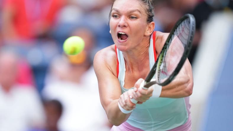 Aug 29, 2022; Flushing, NY, USA; Simona Halep of Romania hits to Daria Snigur of Ukraine on day one of the 2022 U.S. Open tennis tournament at USTA Billie Jean King National Tennis Center. Mandatory Credit: Danielle Parhizkaran-USA TODAY Sports