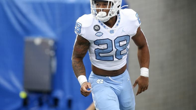 Sep 10, 2022; Atlanta, Georgia, USA; North Carolina Tar Heels running back Omarion Hampton (28) celebrates after a touchdown run against the Georgia State Panthers in the second half at Center Parc Stadium. Mandatory Credit: Brett Davis-USA TODAY Sports