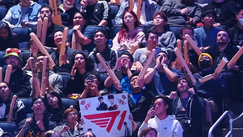 Nov 5, 2022; San Francisco, California, USA; A fan holds a sign for T1 during the League of Legends World Championships against DRX at Chase Center. Mandatory Credit: Kelley L Cox-USA TODAY Sports