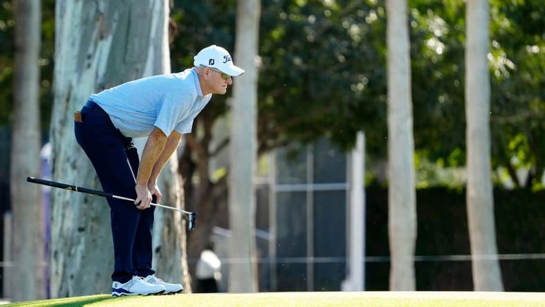 Steve Flesch looks over his putt on the ninth hole during round one of the Charles Schwab Cup at Phoenix Country Club. Mandatory Credit: Rob Schumacher-USA TODAY Sports
