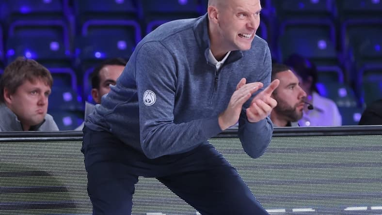 Nov 23, 2022; Paradise Island, BAHAMAS; Brigham Young Cougars head coach Mark Pope reacts during the first half against the USC Trojans at Imperial Arena. Mandatory Credit: Kevin Jairaj-USA TODAY Sports