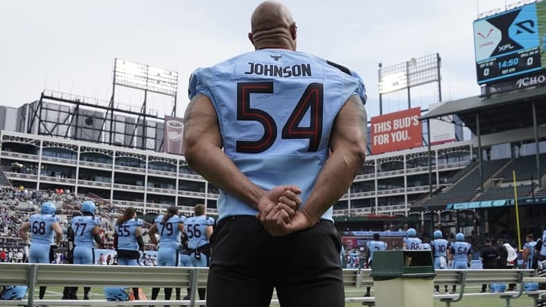 Feb 18, 2023; Arlington, TX, USA; XFL owner Dwayne Johnson on the sidelines during the first half between the Vegas Vipers and the Arlington Renegades at Choctaw Stadium. Mandatory Credit: Raymond Carlin III-USA TODAY Sports