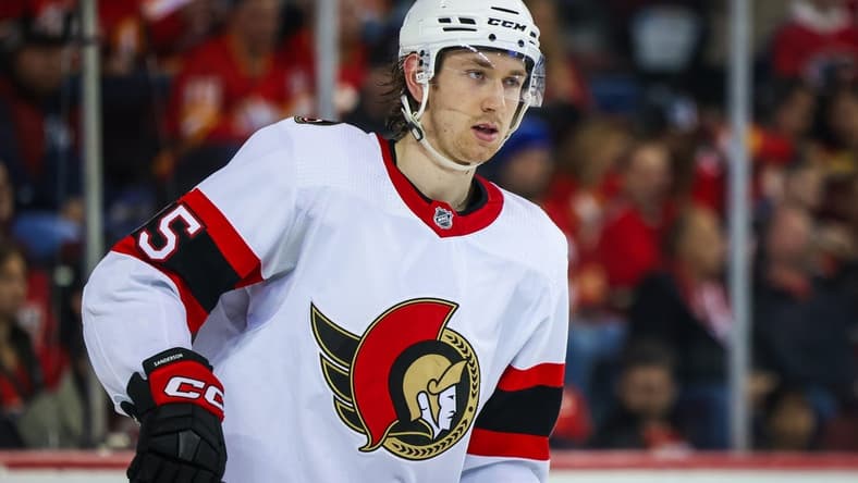 Mar 12, 2023; Calgary, Alberta, CAN; Ottawa Senators defenseman Jake Sanderson (85) skates against the Calgary Flames during the second period at Scotiabank Saddledome. Mandatory Credit: Sergei Belski-USA TODAY Sports