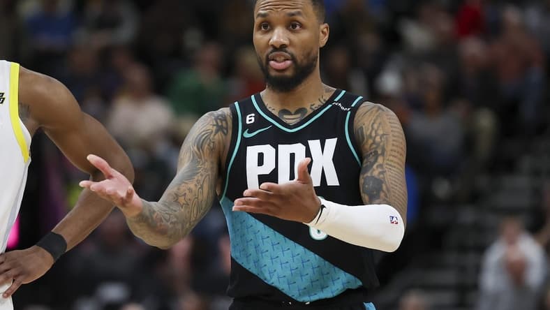 Mar 22, 2023; Salt Lake City, Utah, USA; Portland Trail Blazers guard Damian Lillard (0) reacts to a call against the Utah Jazz in the fourth quarter at Vivint Arena. Mandatory Credit: Rob Gray-USA TODAY Sports