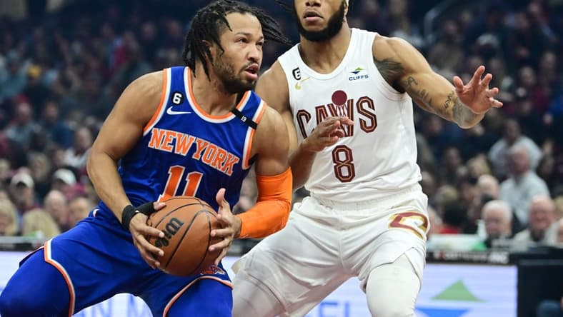 Mar 31, 2023; Cleveland, Ohio, USA; New York Knicks guard Jalen Brunson (11) drives to the basket against Cleveland Cavaliers forward Lamar Stevens (8) during the first half at Rocket Mortgage FieldHouse. Mandatory Credit: Ken Blaze-USA TODAY Sports