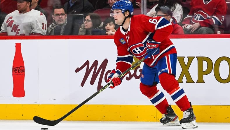 Apr 1, 2023; Montreal, Quebec, CAN; Montreal Canadiens defenseman Chris Wideman (6) plays the puck against the Carolina Hurricanes during the second period at Bell Centre. Mandatory Credit: David Kirouac-USA TODAY Sports
