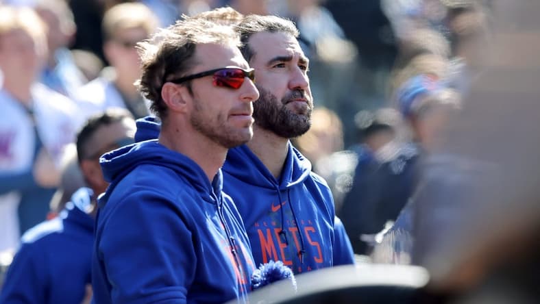 Apr 9, 2023; New York City, New York, USA; New York Mets starting pitchers Max Scherzer (left) and Justin Verlander stand together in the dugout during the seventh inning against the Miami Marlins at Citi Field. Mandatory Credit: Brad Penner-USA TODAY Sports