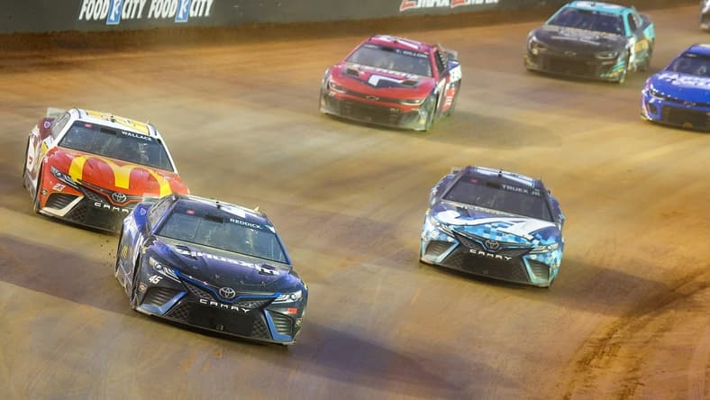 Apr 9, 2023; Bristol, Tennessee, USA; NASCAR Cup Series driver Tyler Reddick (45) leads a pack of cars at the Bristol Motor Speedway Dirt Course. Mandatory Credit: Randy Sartin-USA TODAY Sports
