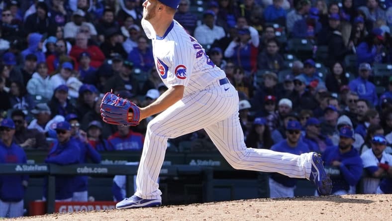 Apr 27, 2023; Chicago, Illinois, USA; Chicago Cubs relief pitcher Brad Boxberger (25) throws against the San Diego Padres during the ninth inning at Wrigley Field. Mandatory Credit: David Banks-USA TODAY Sports