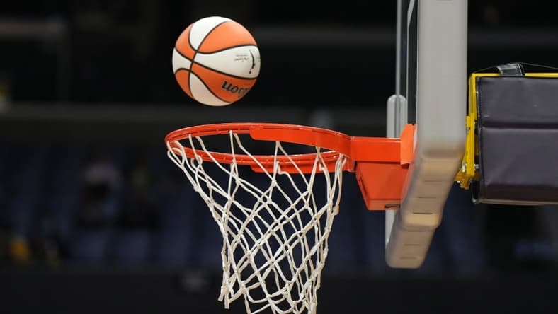 May 25, 2023; Los Angeles, California, USA; Wilson official basketball with WNBA logo goes through the net during the game between the LA Sparks and the Las Vegas Aces at Crypto.com Arena. Mandatory Credit: Kirby Lee-USA TODAY Sports
